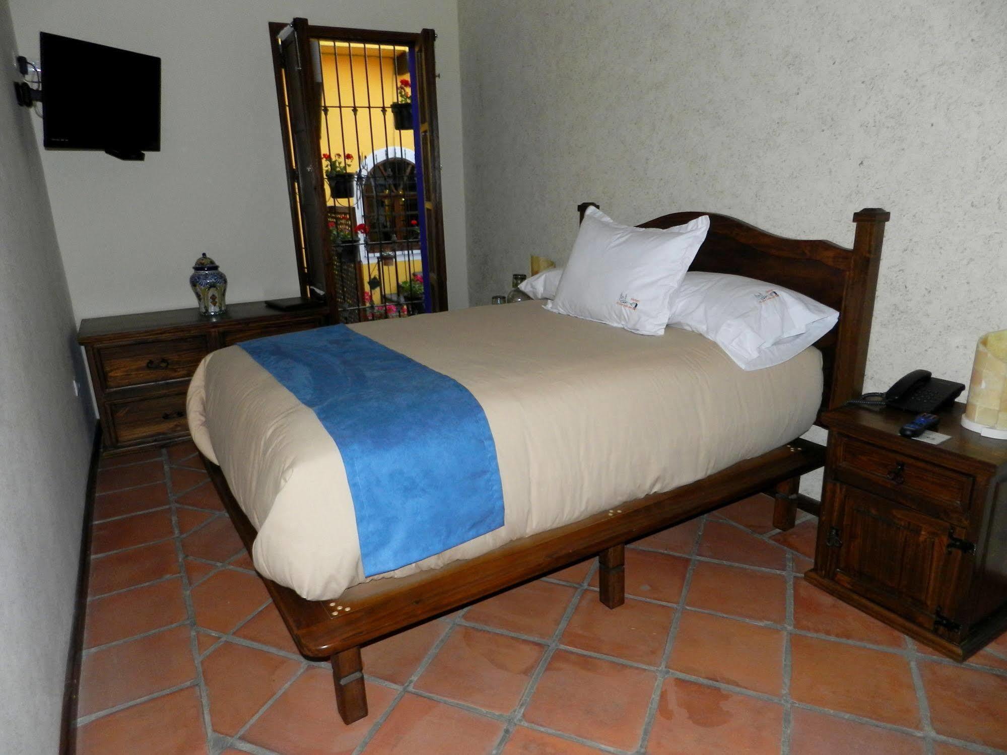 Collection O Al Otro Lado Del Rio, Puebla Hotel Eksteriør billede A room at Hotel San Cristóbal