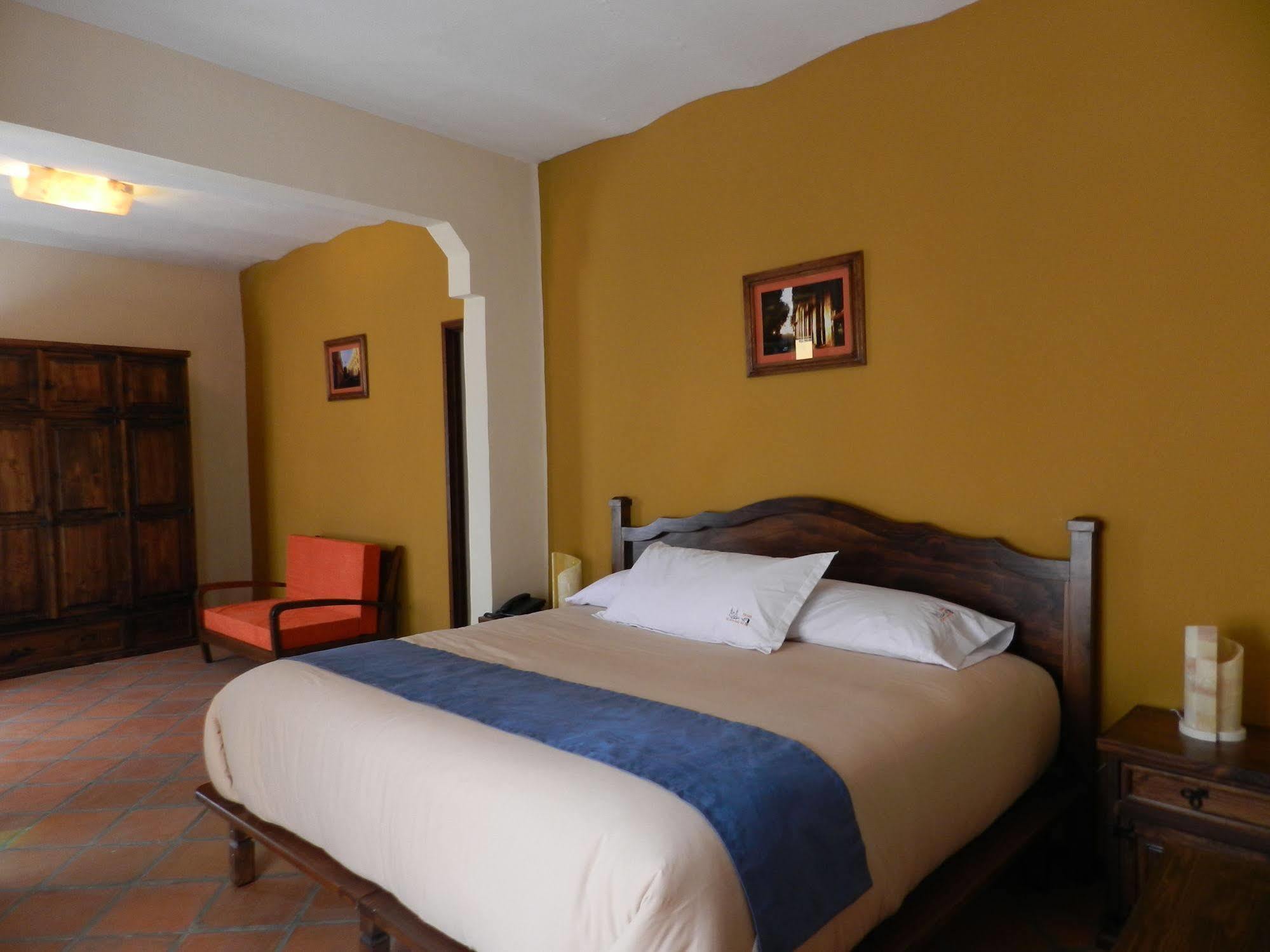 Collection O Al Otro Lado Del Rio, Puebla Hotel Eksteriør billede A bedroom at the hotel