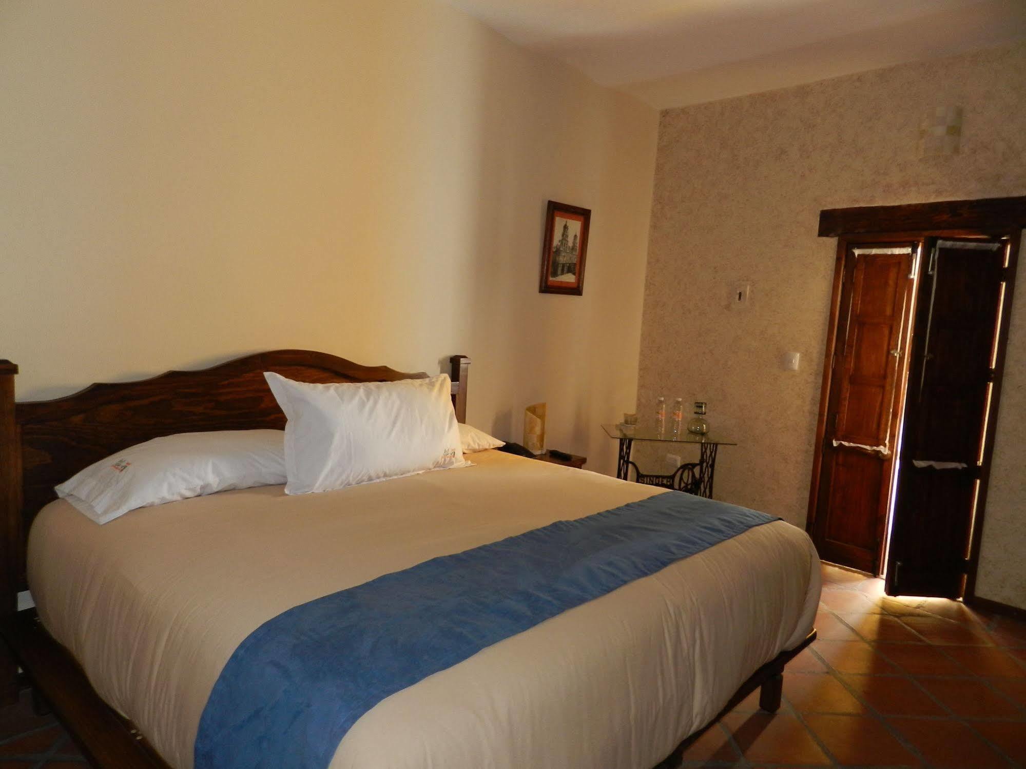 Collection O Al Otro Lado Del Rio, Puebla Hotel Eksteriør billede A bedroom at the hotel