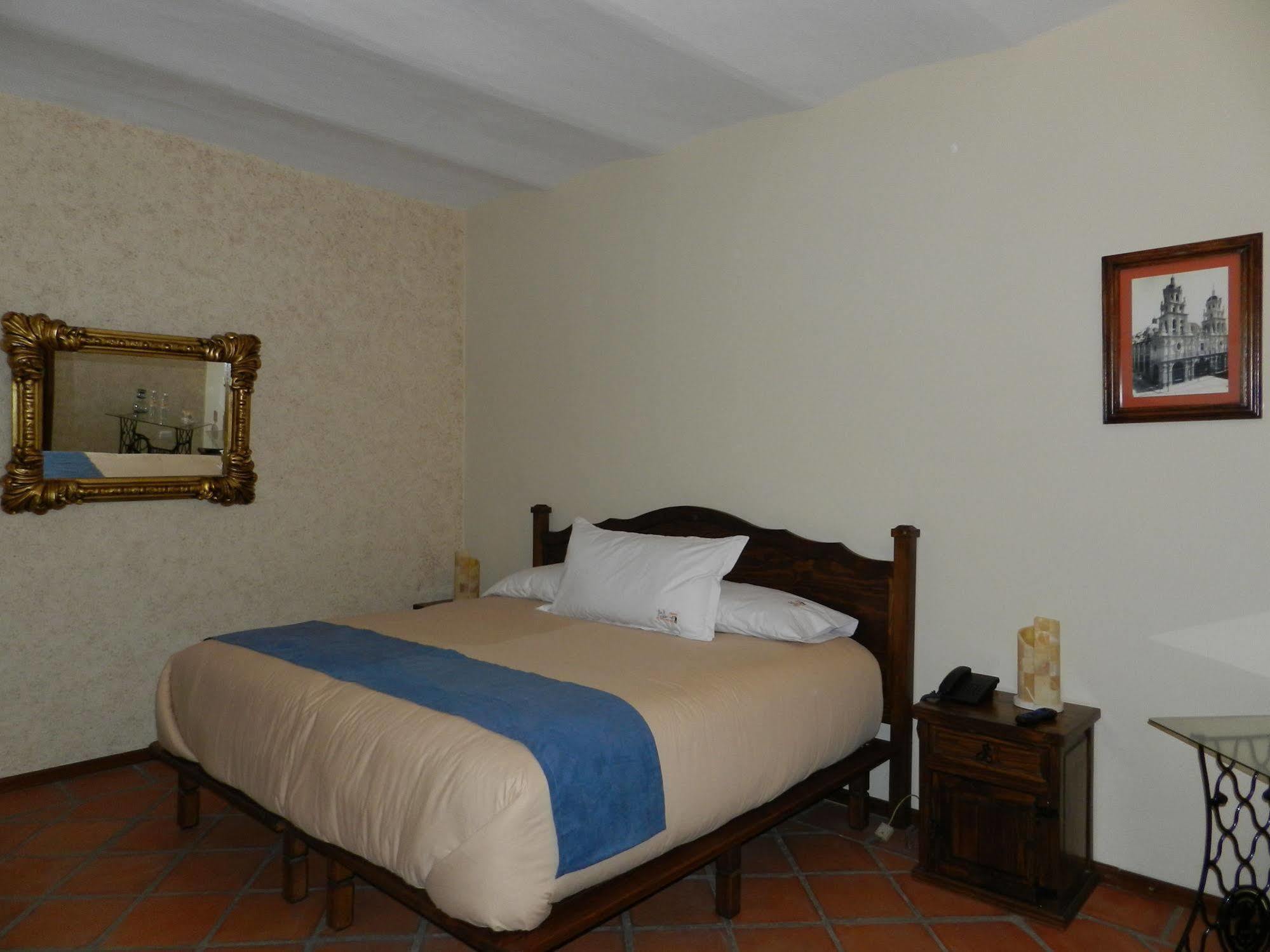 Collection O Al Otro Lado Del Rio, Puebla Hotel Eksteriør billede A room at the hotel